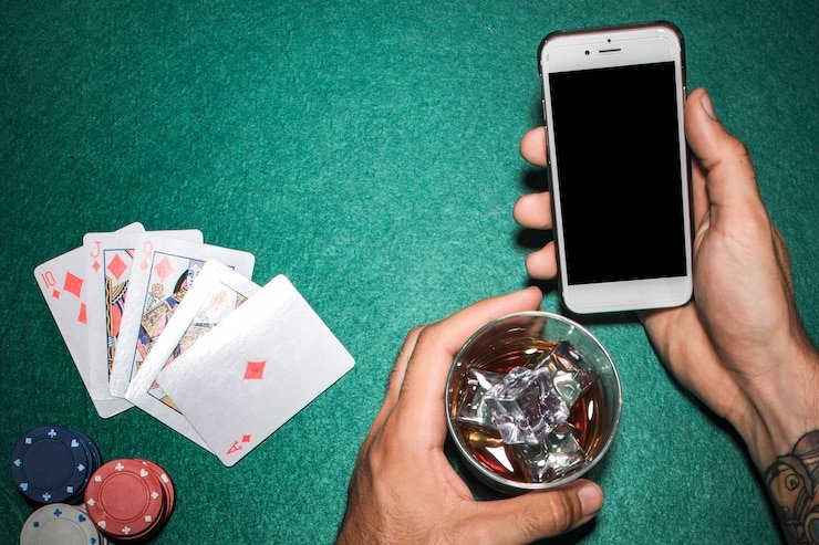 Mobile app showing live blackjack table with subject to verification options